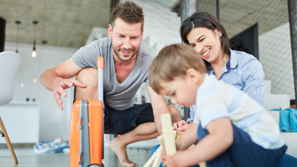 Famiglia che supporta bambino con autismo durante attività quotidiana